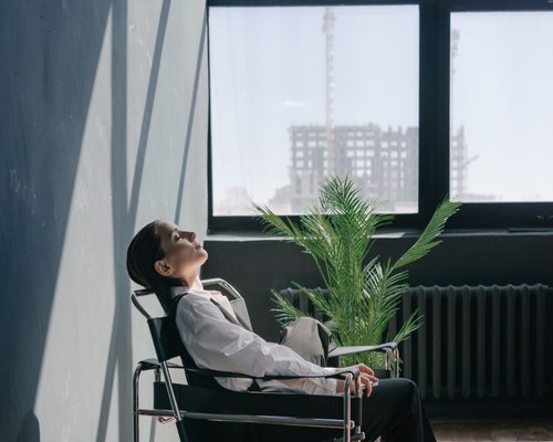 wide view of a person taking a short break at work